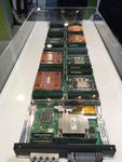 Comparative Benchmarking of the First Generation of HPC-Optimised Arm Processors on Isambard