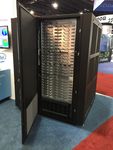 Comparative Benchmarking of the First Generation of HPC-Optimised Arm Processors on Isambard