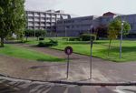 Semantic Pose Verification for Outdoor Visual Localization with Self-supervised Contrastive Learning