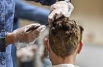 Locks down: German hairdressers reopen despite virus fears