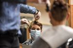 Locks down: German hairdressers reopen despite virus fears