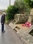 Councillor Peter Dutton laying a wreath on behalf of the Parish Council on Remembrance Sunday - www.huttonsomerset.org.uk @HuttonSomerset