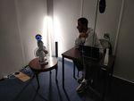 Tell me more! Assessing interactions with social robots from speech